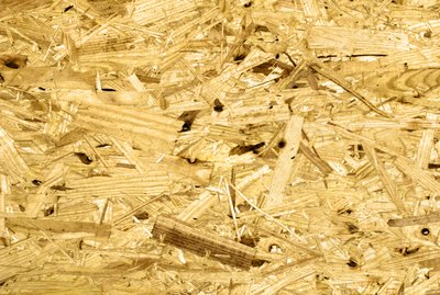 Close-up of texture of wooden particleboard.