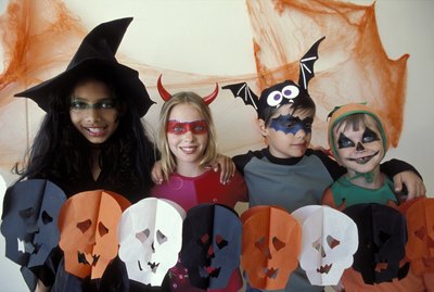 Portrait of children dressed up Halloween costumes