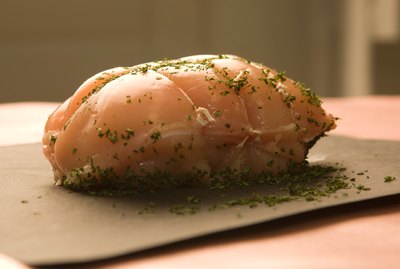 Uncooked roast on counter with seasonings