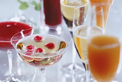Juice with cocktail in glasses, close-up