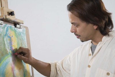 Man drawing with pastels