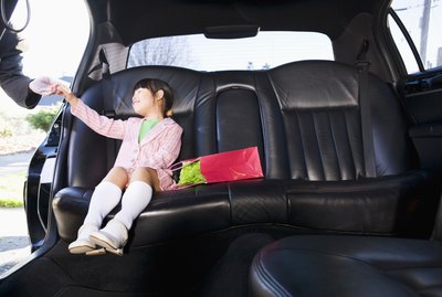Girl sitting in limousine