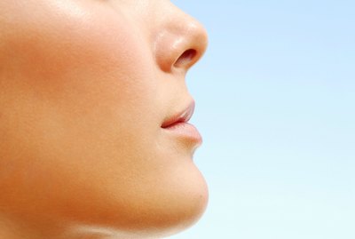 Profile of woman basking in the day