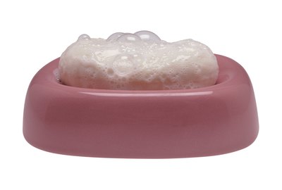 Soap bar, wet, in soapdish