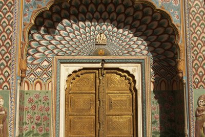 India, Jaipur, City Palace, Peacock Gate decorated arch door surround