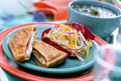 Ham and cheese panini with jicama salad and black bean soup