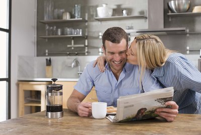 Couple at kitchen table for breakfast