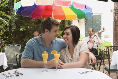 Couple at cafe with mimosas