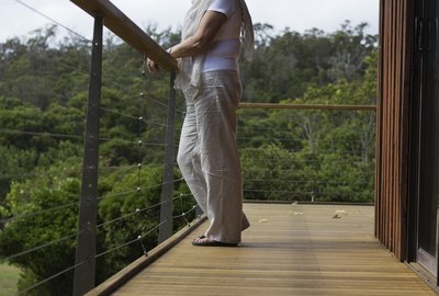 Woman standing on porch