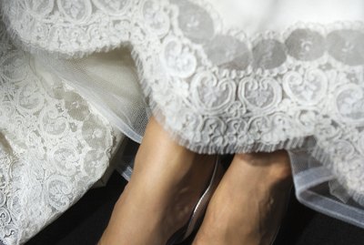 Feet of bride in gown