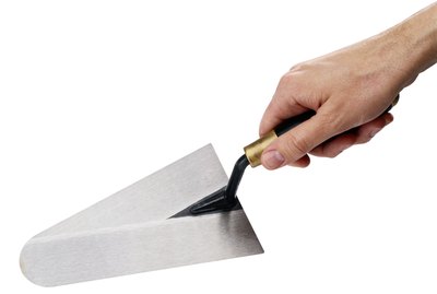 Man Holding a Trowel