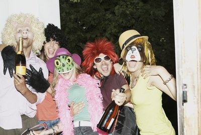 Friends arriving for party in costume