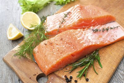 salmon fish fillet with fresh herbs