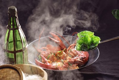 Lobster cooking in wok
