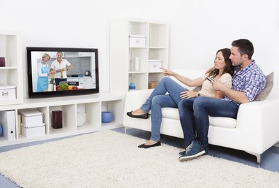 Young Couple Watching Television