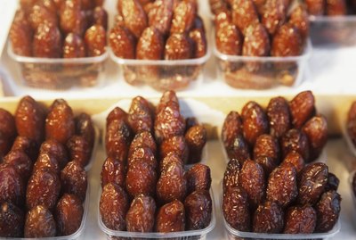 Dried dates in plastic punnets