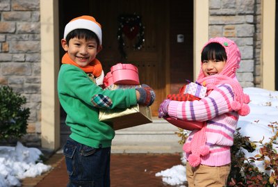 Children holding gift boxes