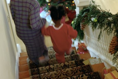 Mother and Daughter Walking Down Stairs on Christmas Morning