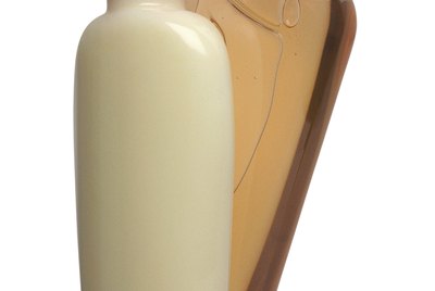 Shampoo and conditioner, in bottles