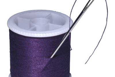 Needle and spool of thread
