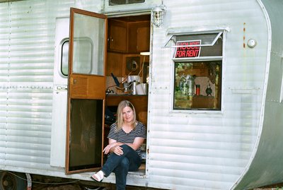 Woman with travel trailer
