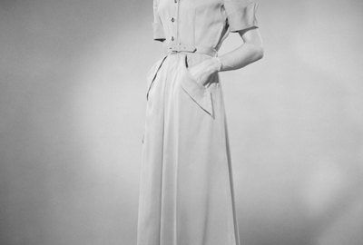 Woman posing in studio (B&W), portrait