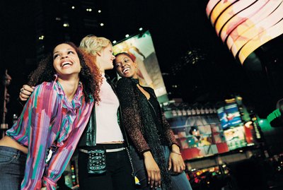 Female Friends in a City at Night