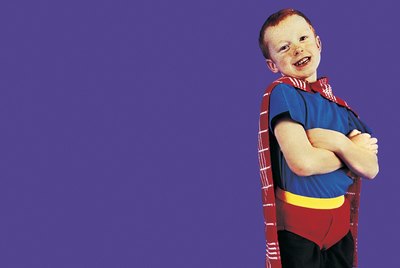 Young Boy Dressed Up as a Superhero