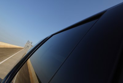 Car driving on desert road