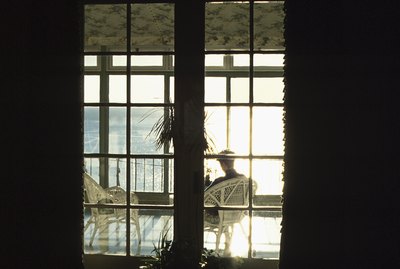 Man seated on porch