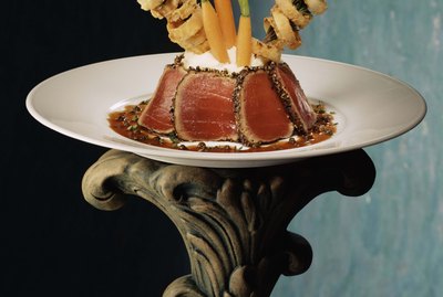 Fancy seared tuna dish on pedestal