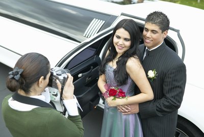 Mother Photographing Couple Departing for Their High School Prom