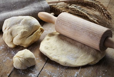 fresh dough and rolling pin