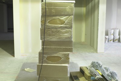 Boxes and supplies in empty office space
