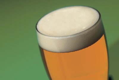 close-up of head of a beer in a glass