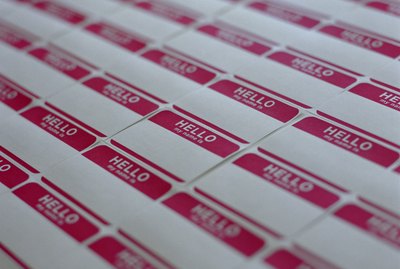 Adhesive name tags