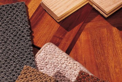 Assorted carpet and wood flooring samples