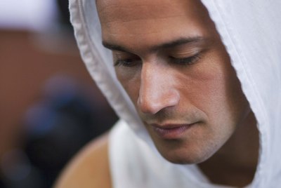 Man in hooded shirt