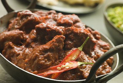 Meat Phall in Karahi with Naan and Green Chilli Curry