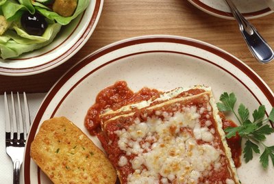 Lasagna , garlic bread and salad