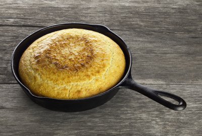 Southern Cornbread In Black Cast Iron Skillet
