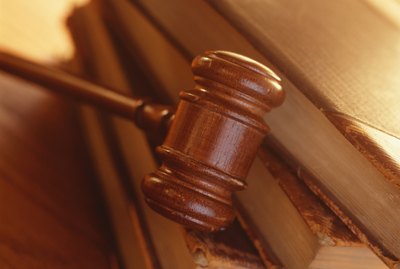 Gavel resting on books