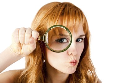 woman with magnifying glass