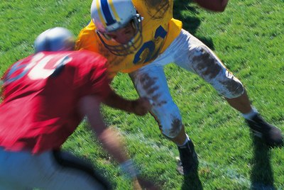 Runner meets tackler in football game