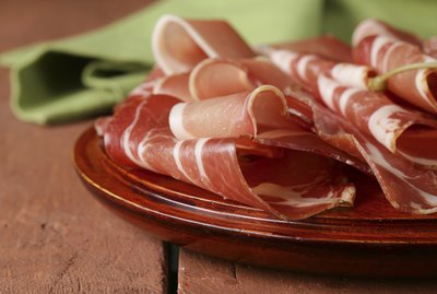sliced dried sausage meat (ham, prosciutto, salami)