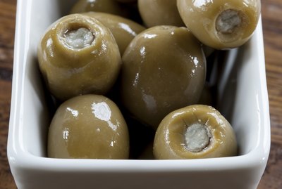 Green Olives in a White Bowl