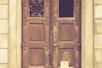 boarded up door to a crypt