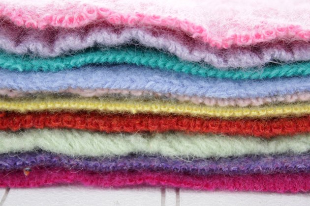 Snuggle up with a good book, a warm cup of tea, and your favorite jammies under this upcycled sweater quilt that you made yourself.