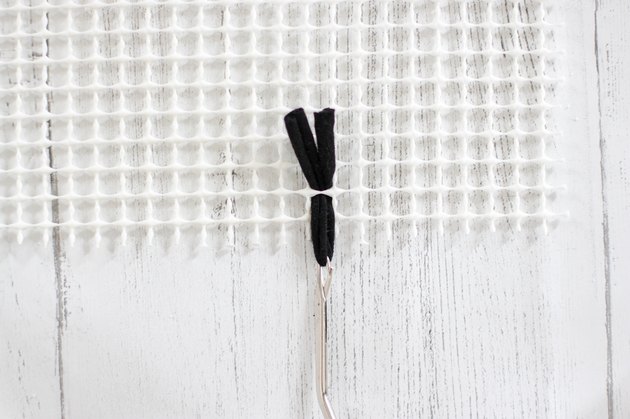 Rug making is a relaxing way to create a beautiful no-waste project. Your friends will be shocked when you tell them that you created this mod, shag rug from old t-shirts.