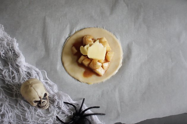 Apple pie filling on top of dough